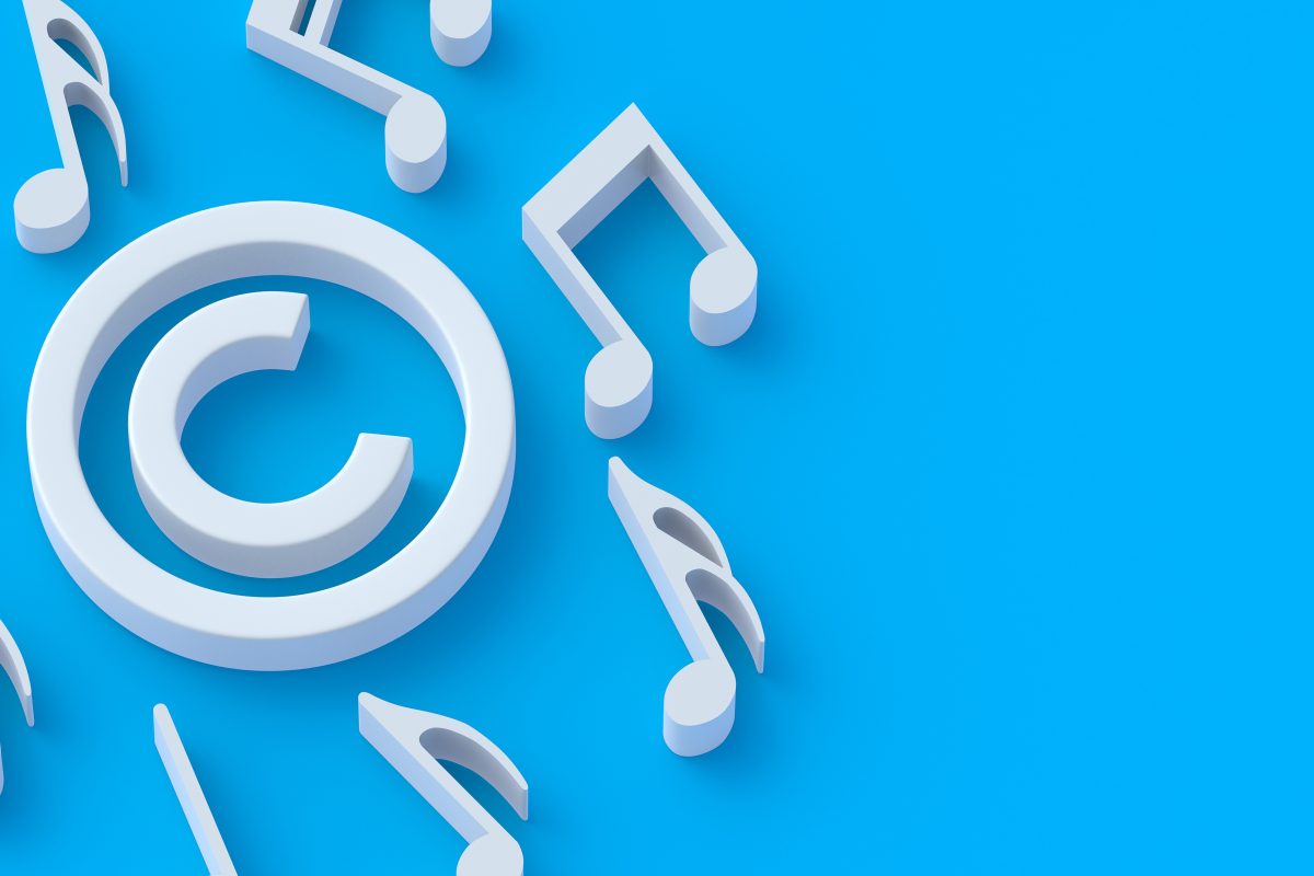 Music notes and a copyright icon in white on a blue background